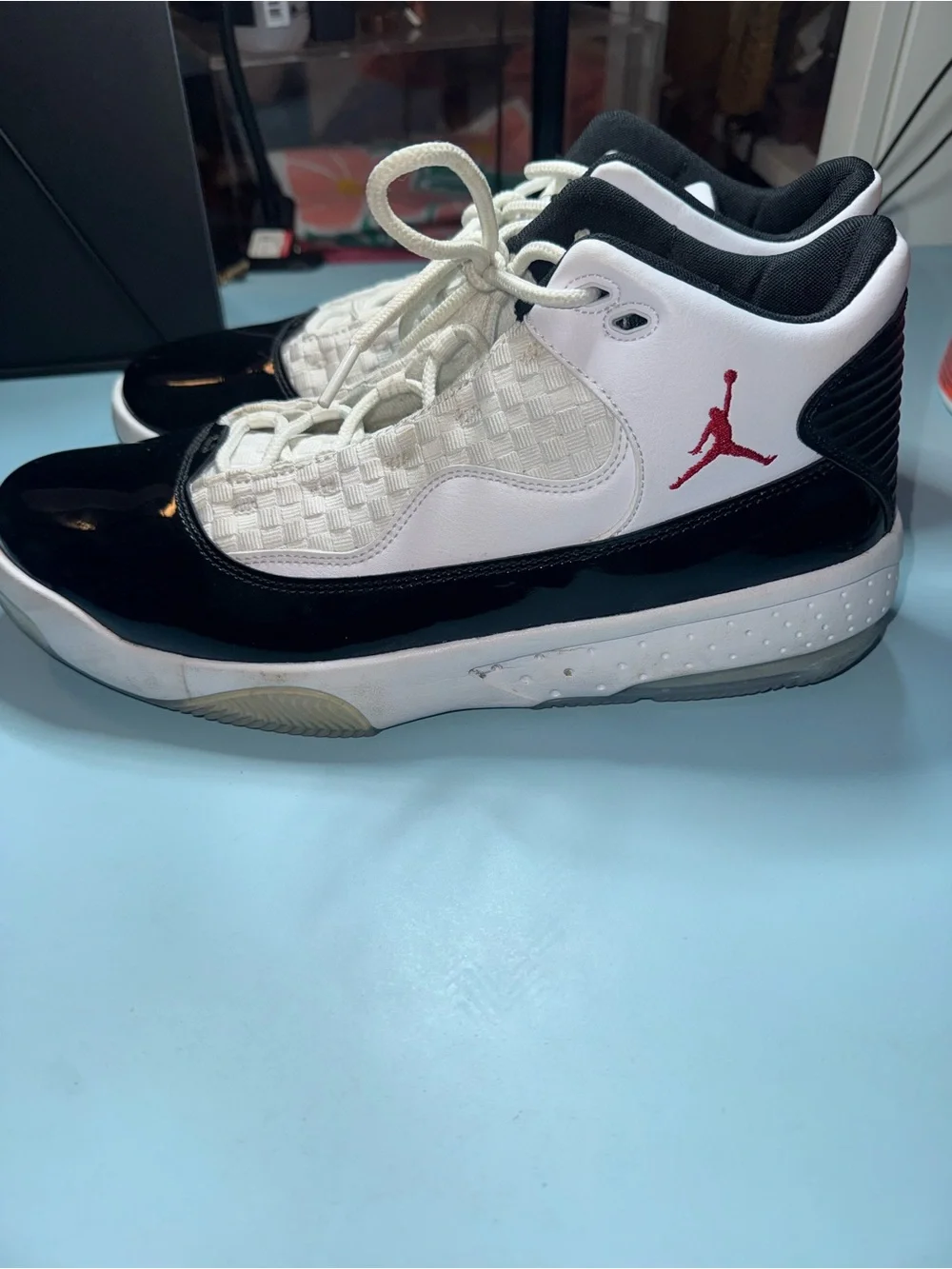 Jordan Black and White Woven Upper Sneakers